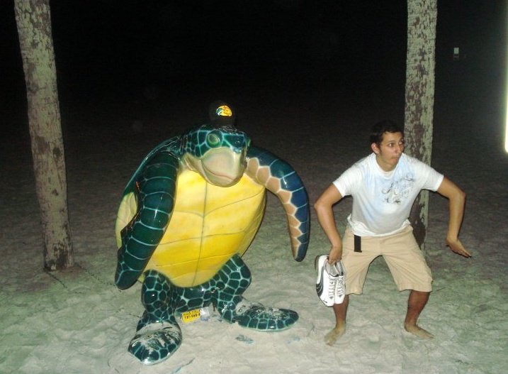 Joel Ebel on Beach with Turtle.jpg